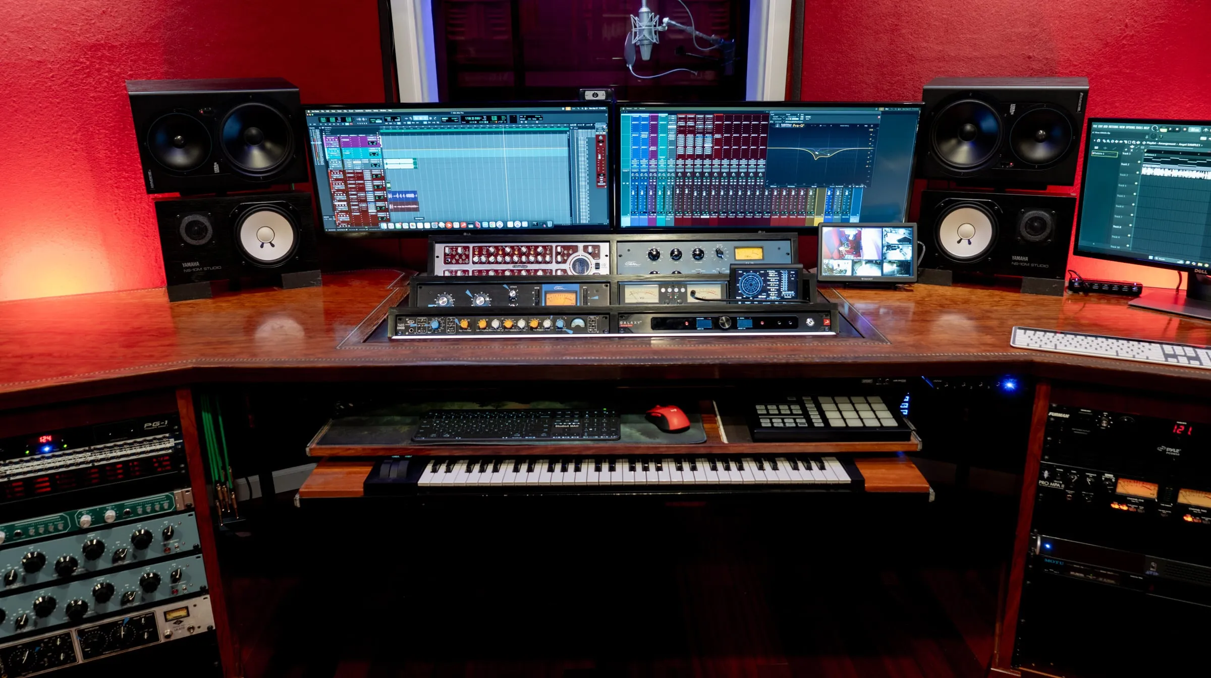 Studio A: the keyboard, the outboard rack and the monitors, ready to build a record.